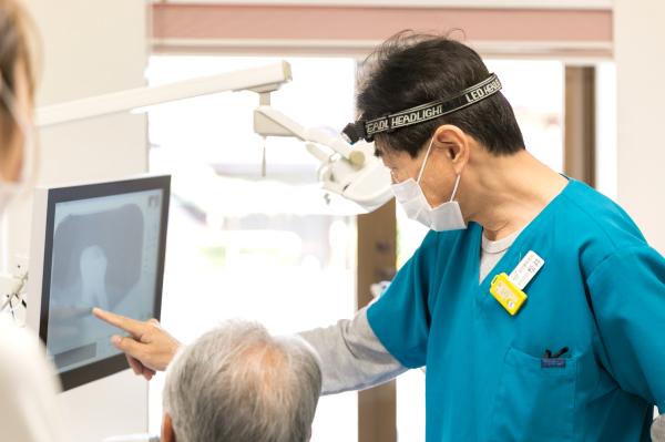 はが歯科医院受付を含む写真